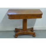 A 19th century walnut fold over card table on a platform base, 72cm tall x 91cm - needs some