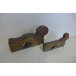 Two brass wood working planes, 19cm and 15cm long