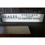 A Beales Department store illuminated sign - in working order, plugs in to a normal socket - 137cm W