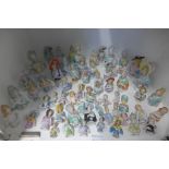 A collection of porcelain half lady pin cushion dolls, approx sixty-five - all generally good