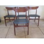 A set of four Schionning and Elgaard teak Danish chairs by Randers Original black seats and makers