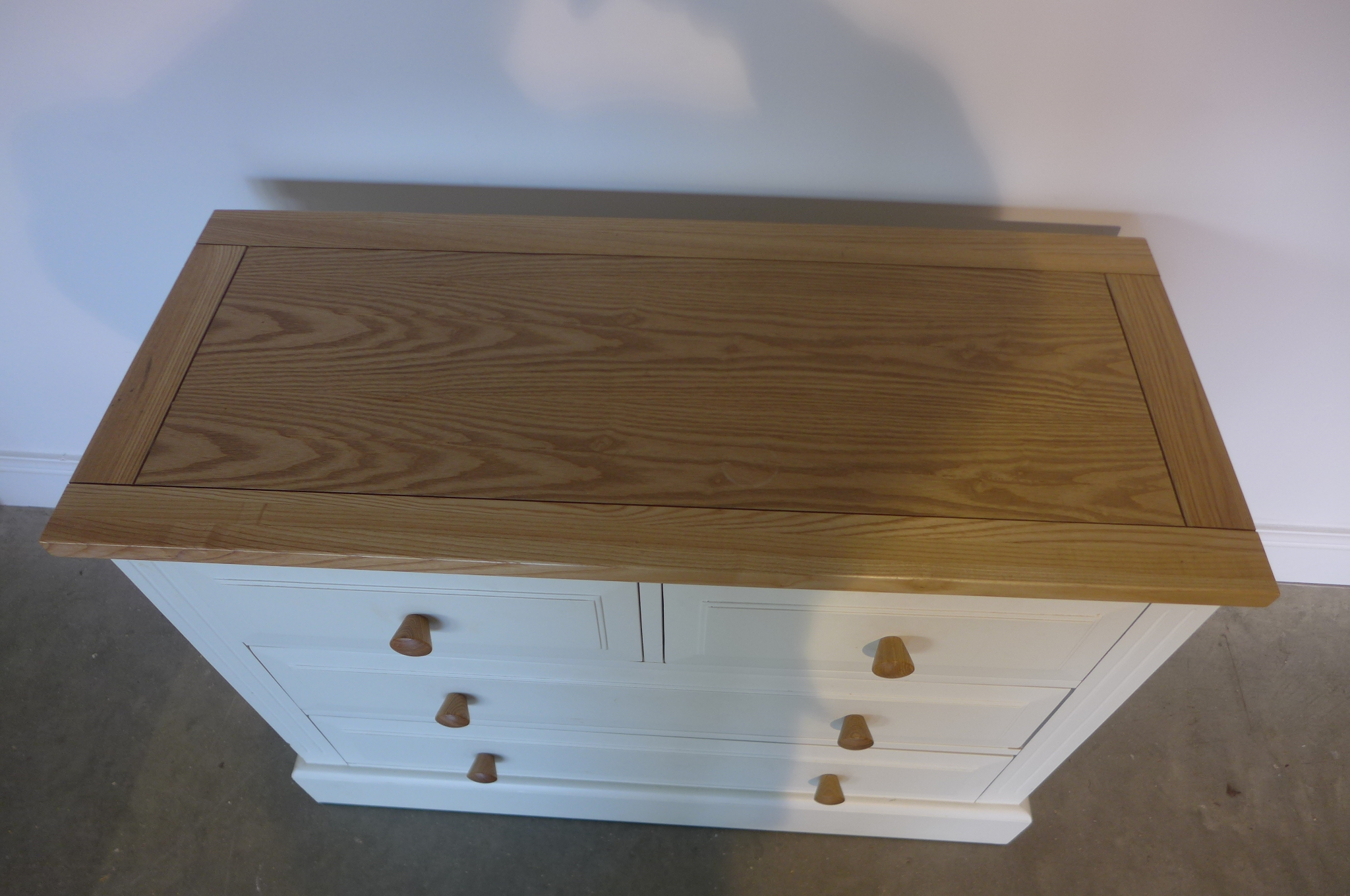 A painted white chest with four drawers, 102cm wide, 76cm high - Image 2 of 2