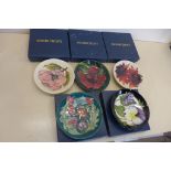 Five Moorcroft pin dishes, all boxed, good condition