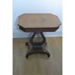 A small mahogany work table on a lyre support, 63cm tall x 60cm x 40cm