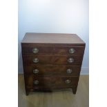 A Georgian mahogany four drawer chest on bracket feet - damage and repair to one back leg, 90cm tall