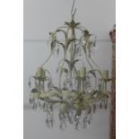 A decorative drop lustre cream metal chandelier 63x48cm tall, plus chain