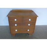 A Victorian and later four drawer pine chest, 83cm tall x 89cm x 46cm