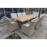 A Bramblecrest 240cm Kuta teak table and eight Oakridge armchairs, ex-display