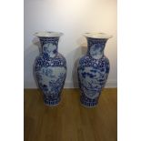 A pair of late 20th/21st century large oriental blue and white vases, 107cm tall, both in good