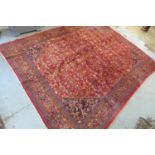 A hand knotted woollen Meshed rug - 397cm x 301cm