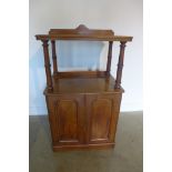 A 19th century mahogany cupboard with two doors, 121cm high, 72cm wide