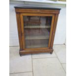 A Victorian rosewood inlaid cabinet with a single glazed door, 106cm tall x 79cm x 29cm