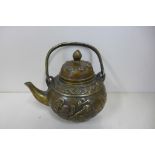 A Chinese bronze teapot, 11cm tall, no obvious damage