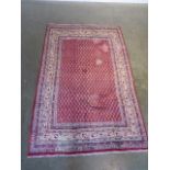 A hand knotted woollen Araak rug - 205cm x 134cm