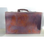 A vintage leather suitcase, 61x18x38cm