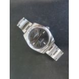 A gents Rolex stainless steel Oyster Perpetual bracelet wristwatch, model 114300, serial number