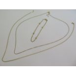 An 18ct yellow gold bracelet and two necklaces, all marked 750 - necklaces all marked 750 -