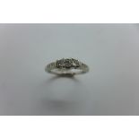 A 9ct hallmarked white gold and diamond ring, size K - approx 1.8 grams, in good condition