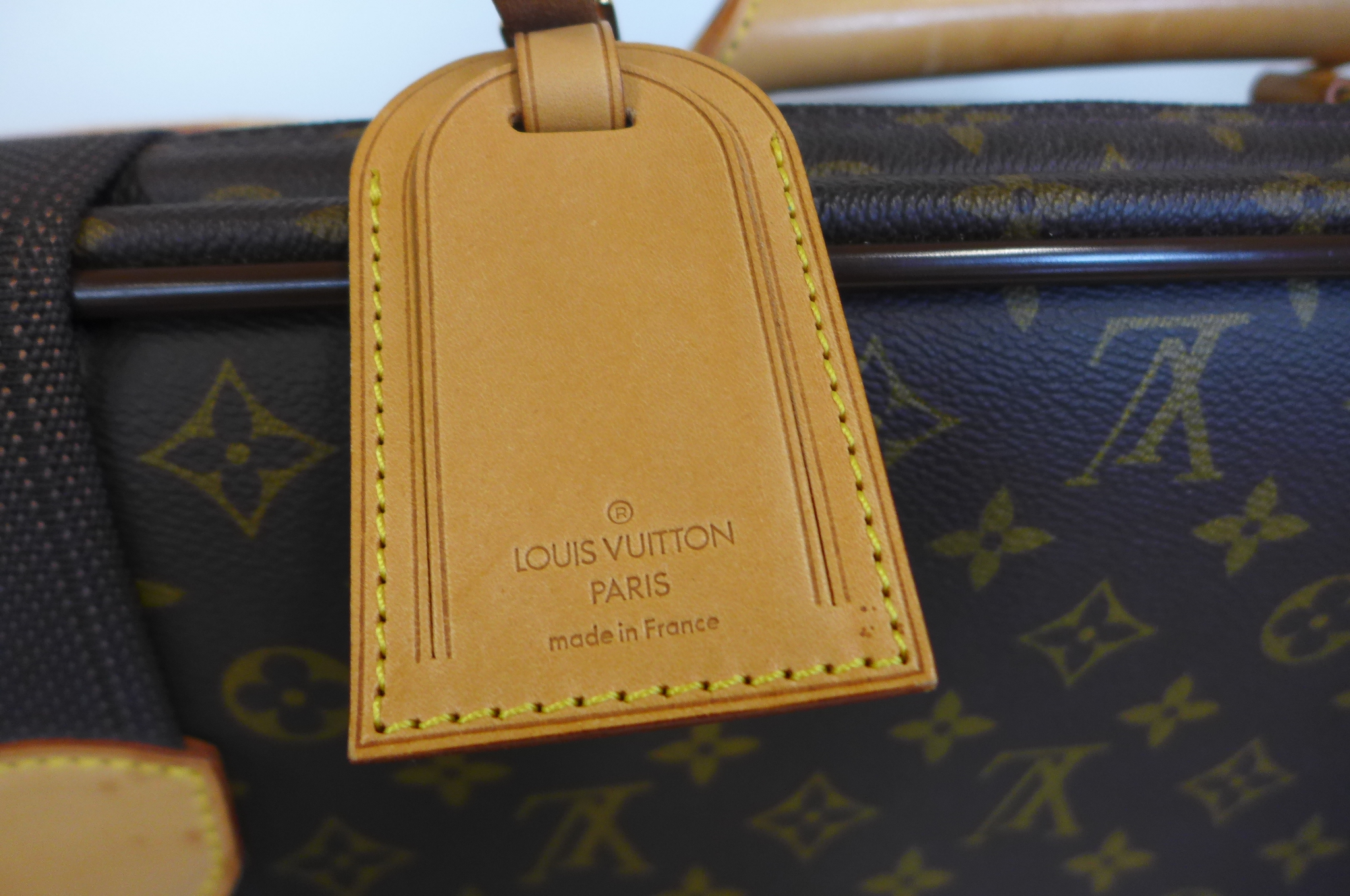 A Louis Vuitton Monogram leather satellite soft suitcase, 60x45x19cm - with No 323 padlock and - Image 3 of 8