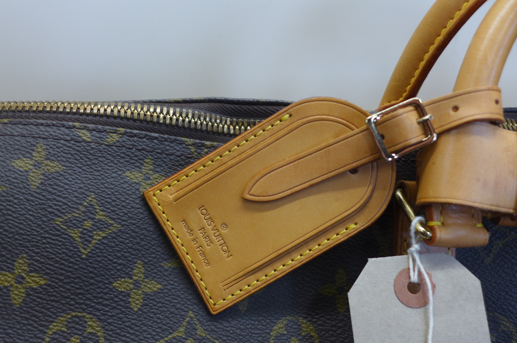 A Louis Vuitton monogram keepall 50 - 56x26x28cm, with padlock and keys, No 303, with luggage label, - Image 2 of 7