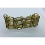 A 9ct yellow gold gatelink bracelet, approx 44.4 grams, in good condition