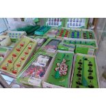 A collection of Subbuteo table soccer teams and accessories