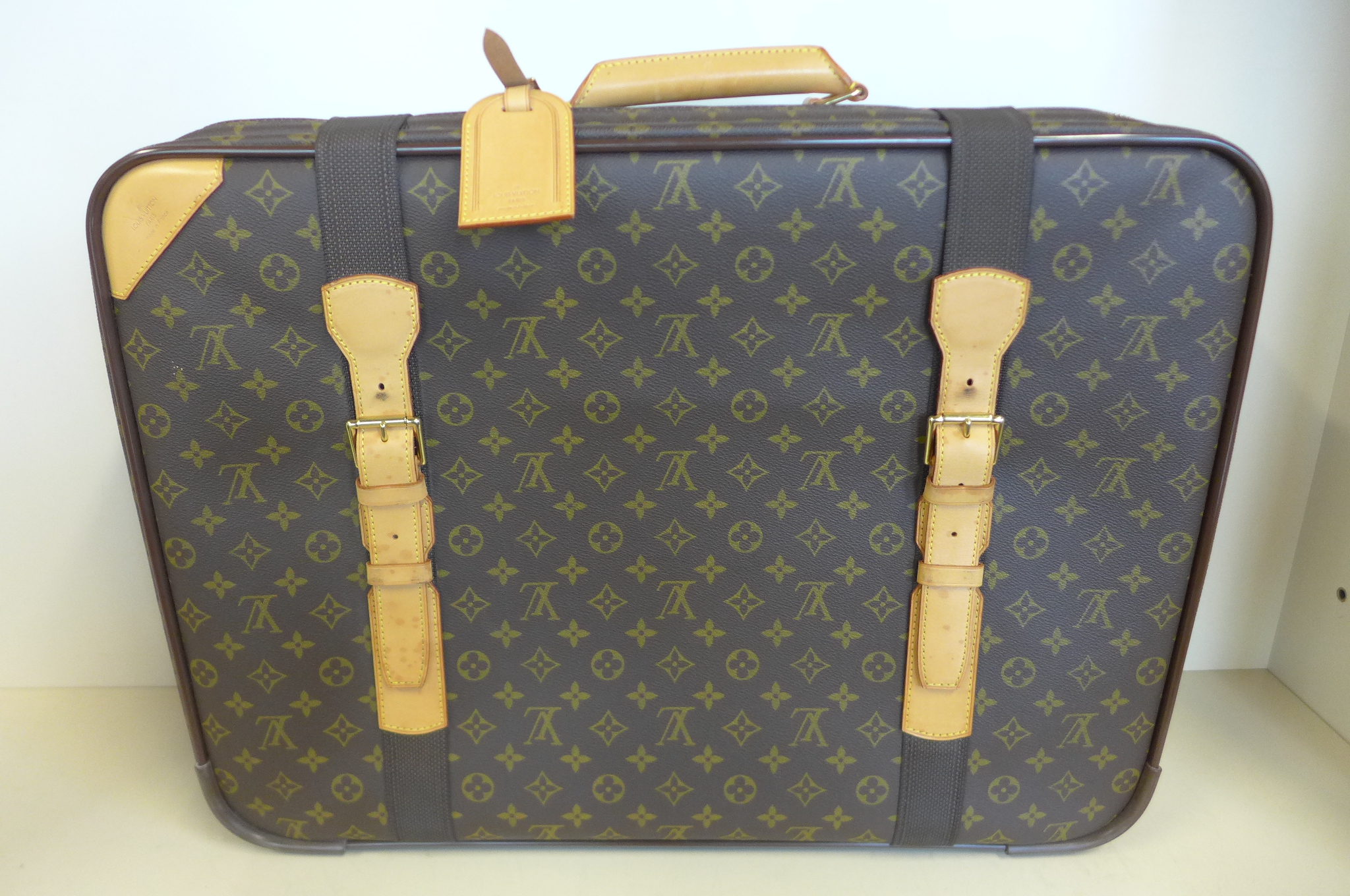 A Louis Vuitton Monogram leather satellite soft suitcase, 60x45x19cm - with No 323 padlock and