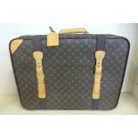 A Louis Vuitton Monogram leather satellite soft suitcase, 60x45x19cm - with No 323 padlock and