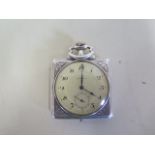 A Longines manual wind silver pocket/travel watch - 6x4.5cm in good condition, some wear, in running