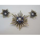 A hallmarked 9ct yellow gold pearl and sapphire star burst brooch and earring set, brooch 30mm wide,