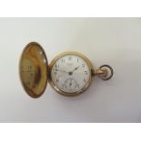 A good Waltham gold plated hunter pocket watch with foliate engraved case, 55mm wide, in good