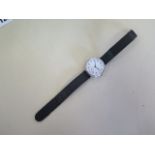 A silver trench watch, manual wind, in good condition, running order, 33mm wide