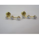 An 18ct yellow gold three stone diamond drop earrings, approx 0.5ct - as new - approx weight 2.2