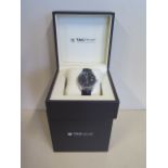 A Tag Heuer Carrera calibre 5 automatic gents stainless steel wristwatch with black dial and date on