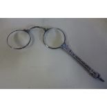 A pair of continental 935 silver lorgnette set with coloured glass or paste, one lens chipped