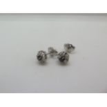 A pair of hallmarked 18ct white gold sapphire and diamond cluster earrings, 8mm wide, approx 2.3