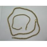 An 18ct yellow and white gold rope twist necklace and bracelet, 50cm x 20cm long, total weight