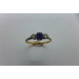An 18ct gold and platinum sapphire and diamond ring, size Q, approx 1.8 grams