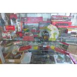 An extensive collection of Hornby railway buildings, track and accessories, many boxed and a boxed