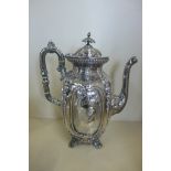 An embossed silver coffee pot with figural and Amorial engraving, Sheffield 1856/57 maker R&S 27cm
