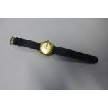 A gents Omega quartz wristwatch in gold plated case, brushed gold finish dial with baton markers,