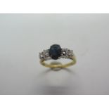 An 18ct hallmarked gold sapphire and diamond ring, diamond weight approx .55pts, VS2 - sapphire