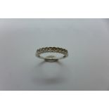 An 18ct white gold diamond ring, 0.25ct in total, size L/M - marked 750 - approx 2 grams, in good