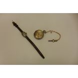 A ladies silver dress watch, not running, and a silver pocket watch, running but missing glass and