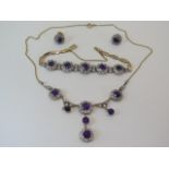 A 9ct yellow gold amethyst and white stone necklace, bracelet and earring set, the necklace marked