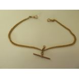 A hallmarked 9ct yellow gold double Albert watch chain, 40cm long, in good condition, approx 28