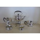 A very good quality silver five piece silver tea and coffee set with silver spirit kettle and stand,