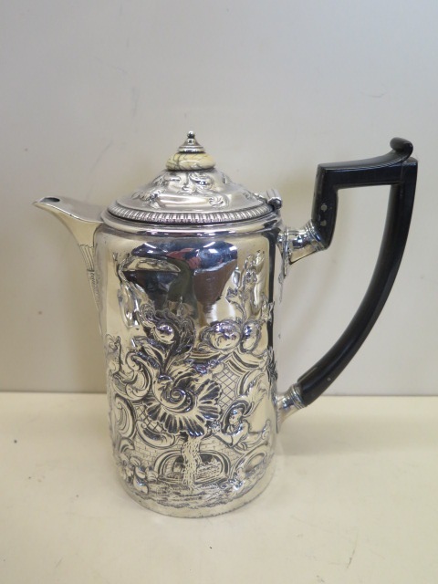 A Georgian silver embossed water jug London 1809 - William Burwash and Richard Sibley 19cm tall,