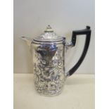 A Georgian silver embossed water jug London 1809 - William Burwash and Richard Sibley 19cm tall,