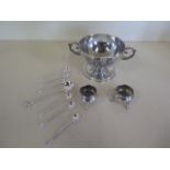 A pair of silver salts, a silver twin handle bowl, approx 9.6 troy oz and seven coin spoons